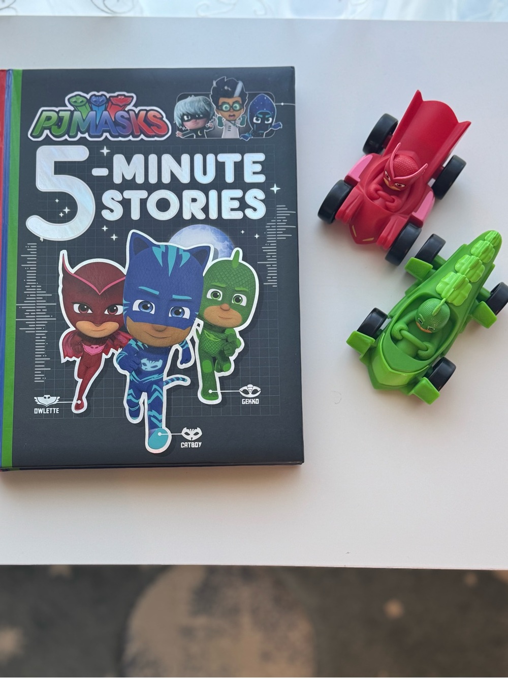 PJ Masks 5-Minute Stories Book with Red and Green Race Cars